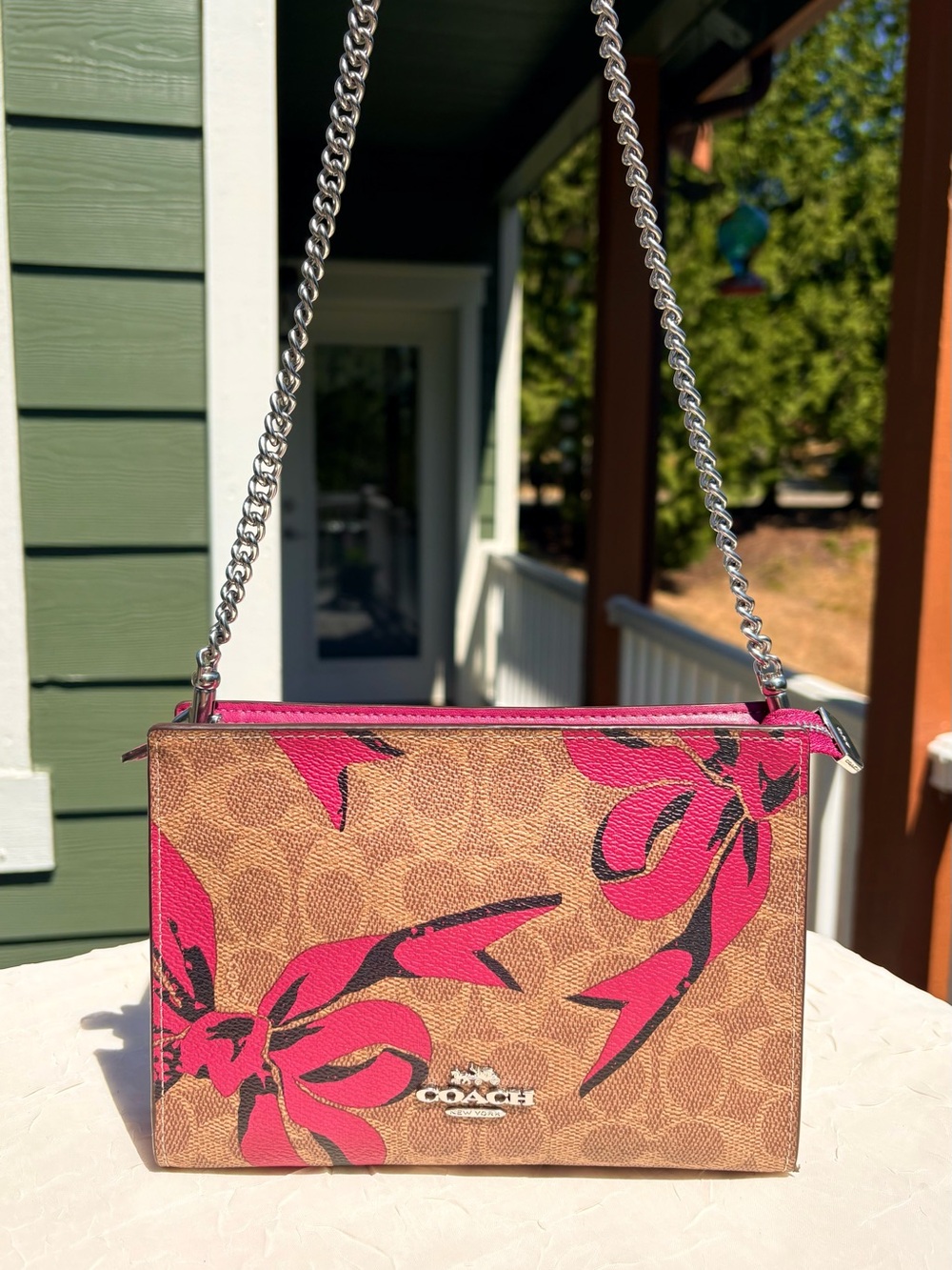 COACH Slim Crossbody In Signature Canvas With Pink Bow Print CY746